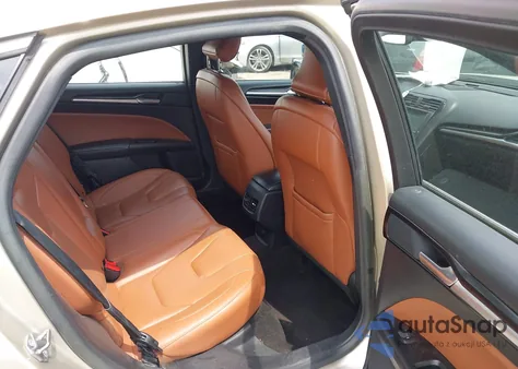 2019 Ford Fusion Hybrid Titanium from USA, damaged, VIN 3FA6P0RU6KR141336